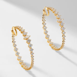 LEAH STATEMENT HOOP EARRINGS IN GOLD PLATING.